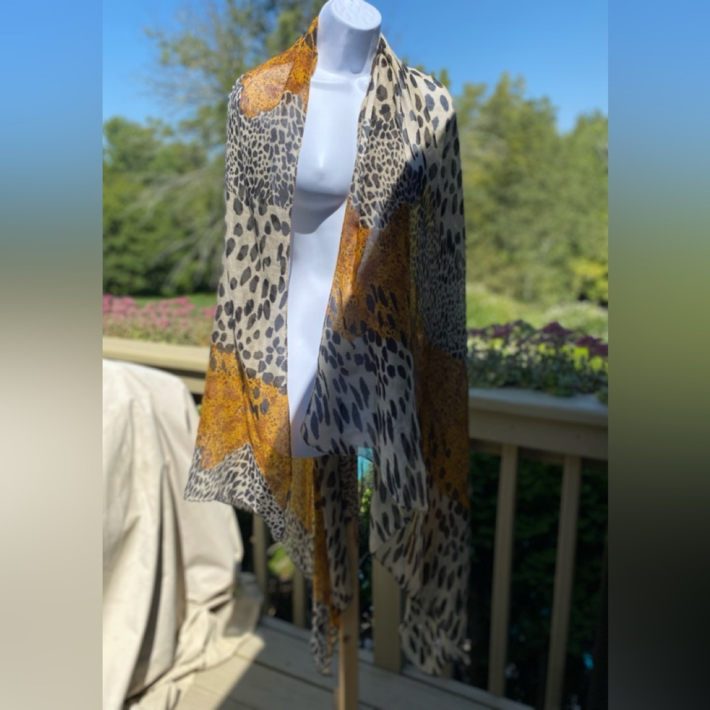 NWOT Animal print tan/black/brown/mustard rayon long scarf/wrap Size: 72 x 44
